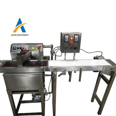 máquina de la fabricación de chocolate 380v que envuelve la máquina de fusión cubierta del chocolate comercial