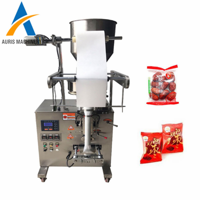 Gránulo automático que pesa las habas de la empaquetadora del chocolate que sellan la máquina
